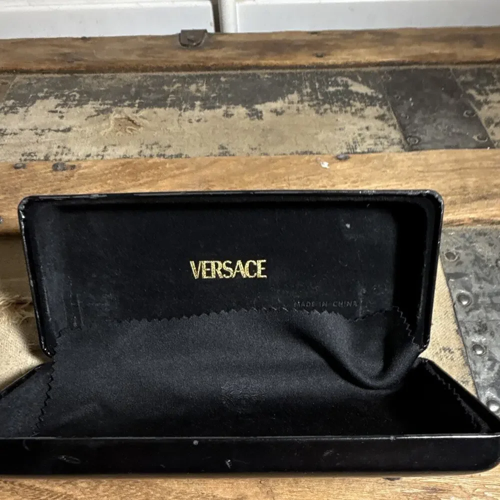 Versace medusa clamshell